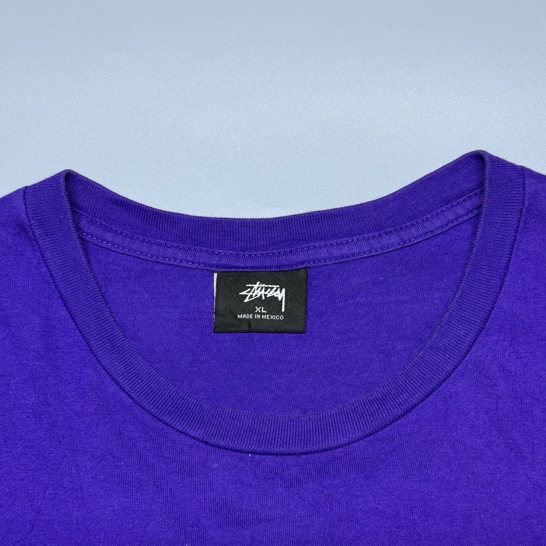 Stussy Purple Tee (Category: Tshirts & Polo Shirts ) located in Kabacan. Submitted by rags2penny.phl (Listing ID 1468339489, Image 3). Description: - Brand: Stussy - Color: Bright Purple - Size: XL - Material: 100% Cotton - Design: Small chest logo, large graffiti back print - Condition: Clean, graphics intact with zero cracking - Origin: Made in Mexico Measurements : 20.5 x 28.