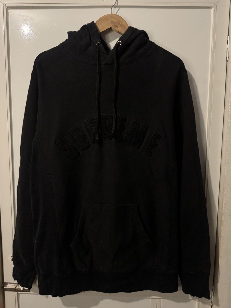 Supreme Arc Logo Hooded Sweatshirt Black (Category: Hoodies) located in Alaminos. Submitted by outfitcheck.ph (Listing ID 1468414720, Image 1). Description: - Brand: Supreme (Made in Canada) - Color: Black with tonal chenille arc logo - Material: 100% heavyweight cotton - Features: Kangaroo pocket, matching drawstrings, ribbed side panels, cuffs, and hem - Condition: Classic streetwear piece with intact interior tags - Shipping or meetups availab