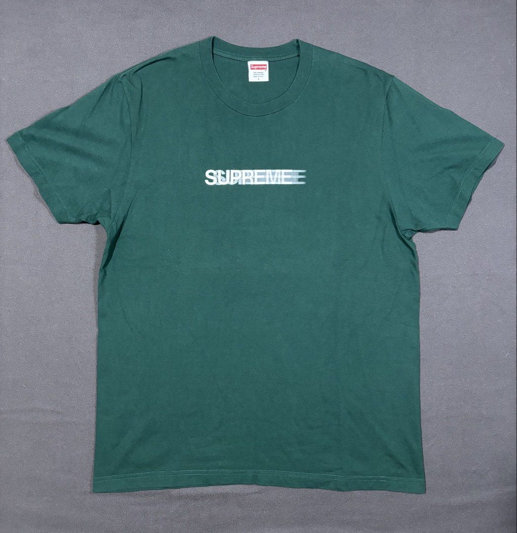 Supreme Motion Logo Tee Green Size L (Category: Tshirts & Polo Shirts ) located in Mabalacat. Submitted by _limitlessfashion (Listing ID 1468290423, Image 1). Description: - Supreme - Motion Logo Tee - Dark Green - Size: Large - Length 28 - Width 21 - Material: 100% Pre-shrunk Cotton (Made in USA) - Condition: Pre-loved with minor wear around the collar ribbing, clean front graphic - Details: Includes original collar tag and inside care label - M