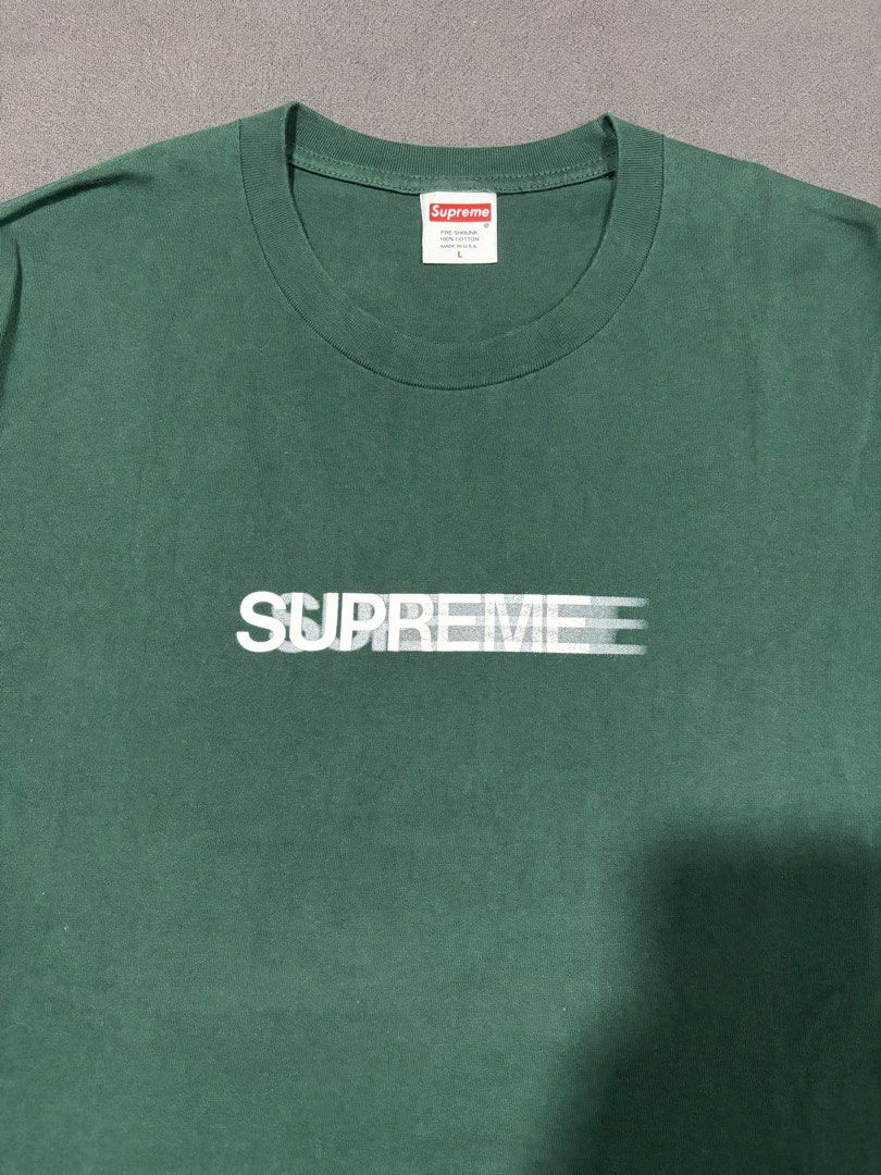 Supreme Motion Logo Tee Green Size L (Category: Tshirts & Polo Shirts ) located in Mabalacat. Submitted by _limitlessfashion (Listing ID 1468290423, Image 2). Description: - Supreme - Motion Logo Tee - Dark Green - Size: Large - Length 28 - Width 21 - Material: 100% Pre-shrunk Cotton (Made in USA) - Condition: Pre-loved with minor wear around the collar ribbing, clean front graphic - Details: Includes original collar tag and inside care label - M