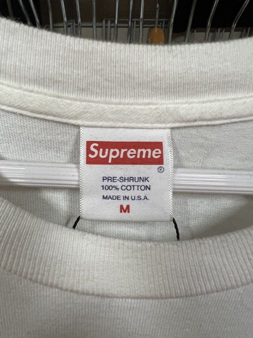 Supreme Phone Booth Graphic Tee White Size M (Category: Tshirts & Polo Shirts ) located in Baguio. Submitted by thrash2cash_2600 (Listing ID 1468374712, Image 2). Description: - Brand: Supreme - Color: White - Size: Medium - Design: Blue phone booth graphic on the chest - Details: Classic box logo tag at the collar and RN care tag at the back - Fit/Style: Short sleeves, clean fabric, perfect comfortable everyday streetwear.