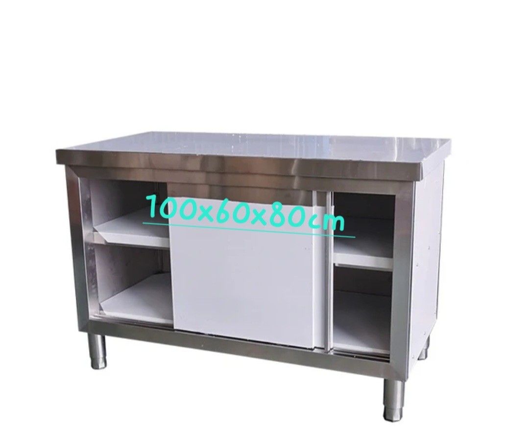 SUS 304 Stainless Steel Kitchen Workbench with Sliding Doors (Category: Bathroom & Kitchen Fixtures) located in Manila. Submitted by oddcrystal_66a000 (Listing ID 1468359730, Image 1). Description: - Material: Commercial-grade SUS 304 stainless steel - Dimensions: 100 x 60 x 80 cm - Features: Front sliding doors and dual-layer interior shelving for organized storage - Condition: Brand new with protective plastic film still intact - Ideal for: Com