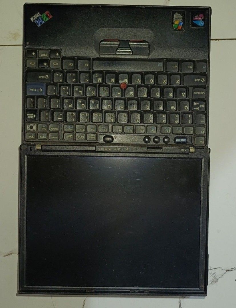 Swap only IBM ThinkPad X40 with Ultralight dock (Category: Laptops & Notebooks) located in Naga. Submitted by brightsideofthemoon (Listing ID 1468454388, Image 2). Description: Working condition missing a key and a dead battery. preferably swap to another thinkpad like the x61, t60, x200, or t400 or anything else as long as it's a thinkpad. maybe a t480 that's defective if you're feeling generous :p.