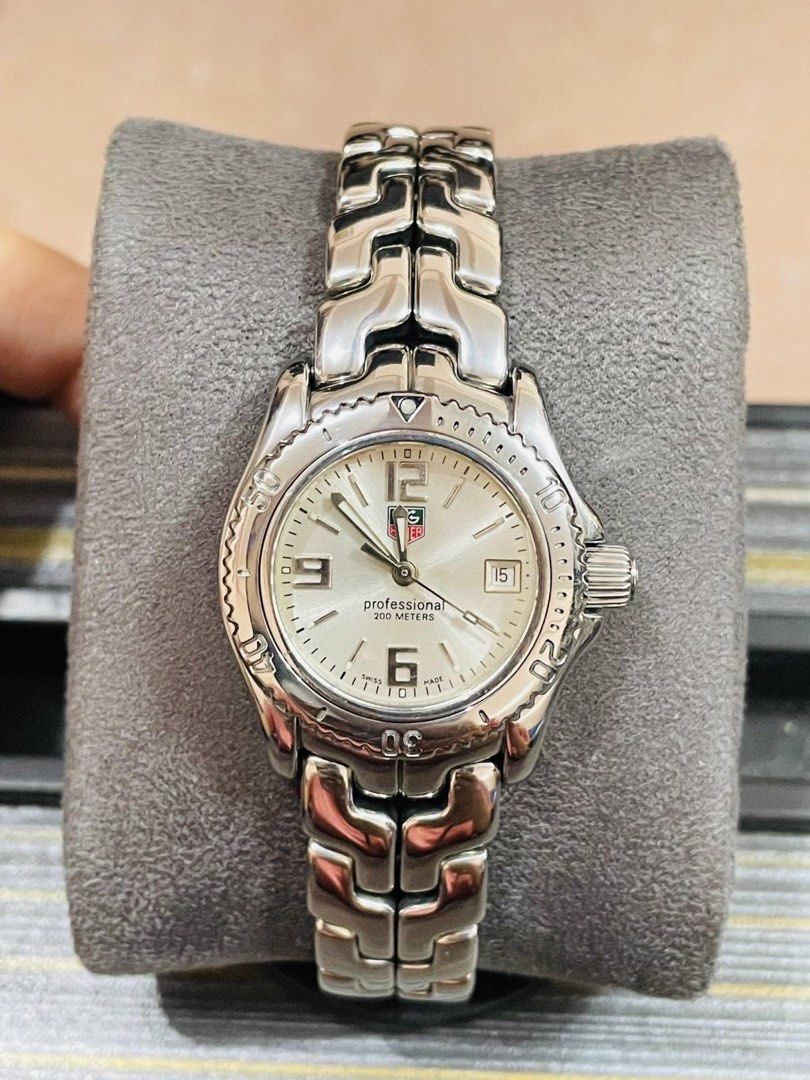 TAG Heuer Link Ladies WT1416 (Category: Luxury Watches) located in Paranaque City. Submitted by robertsoon.08 (Listing ID 1468334157, Image 1). Description: TAG Heuer Link Ladies WT1416 Swiss Quartz Movement 28mm case size Fits up to 5.6 inches small wrist only no extra Good running condition Preloved used watch Authentic/Original Watch only!! with provided box ordinary.