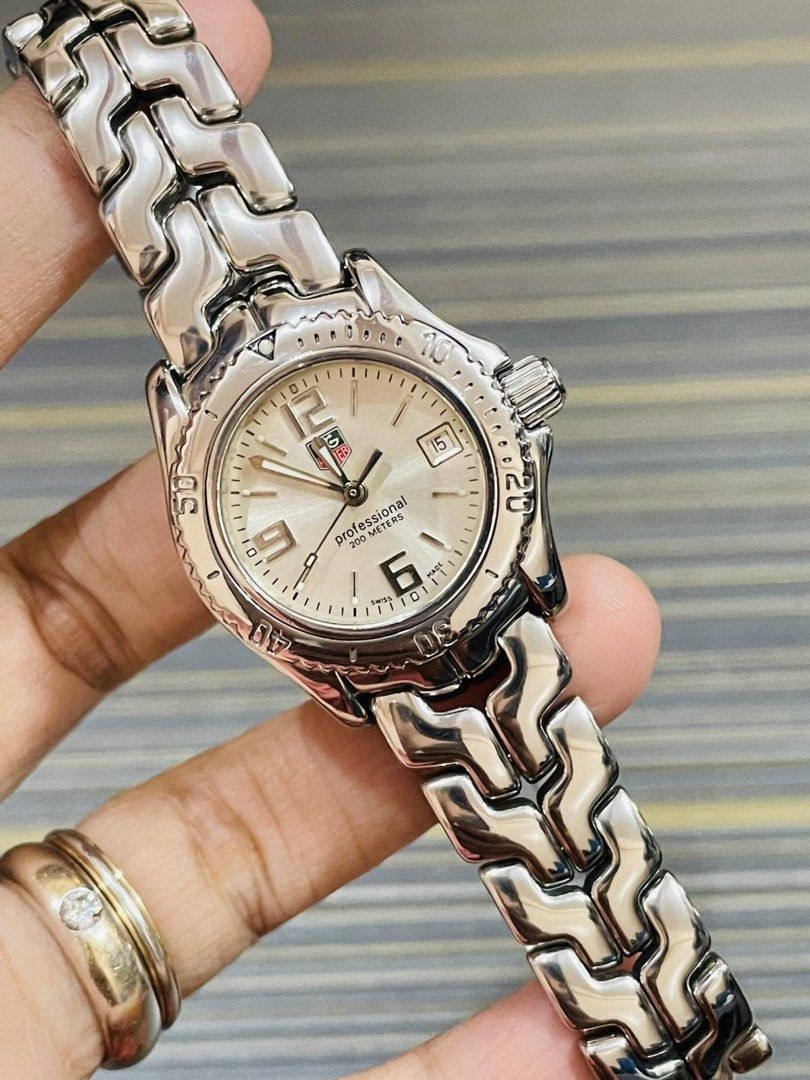 TAG Heuer Link Ladies WT1416 (Category: Luxury Watches) located in Paranaque City. Submitted by robertsoon.08 (Listing ID 1468334157, Image 2). Description: TAG Heuer Link Ladies WT1416 Swiss Quartz Movement 28mm case size Fits up to 5.6 inches small wrist only no extra Good running condition Preloved used watch Authentic/Original Watch only!! with provided box ordinary.
