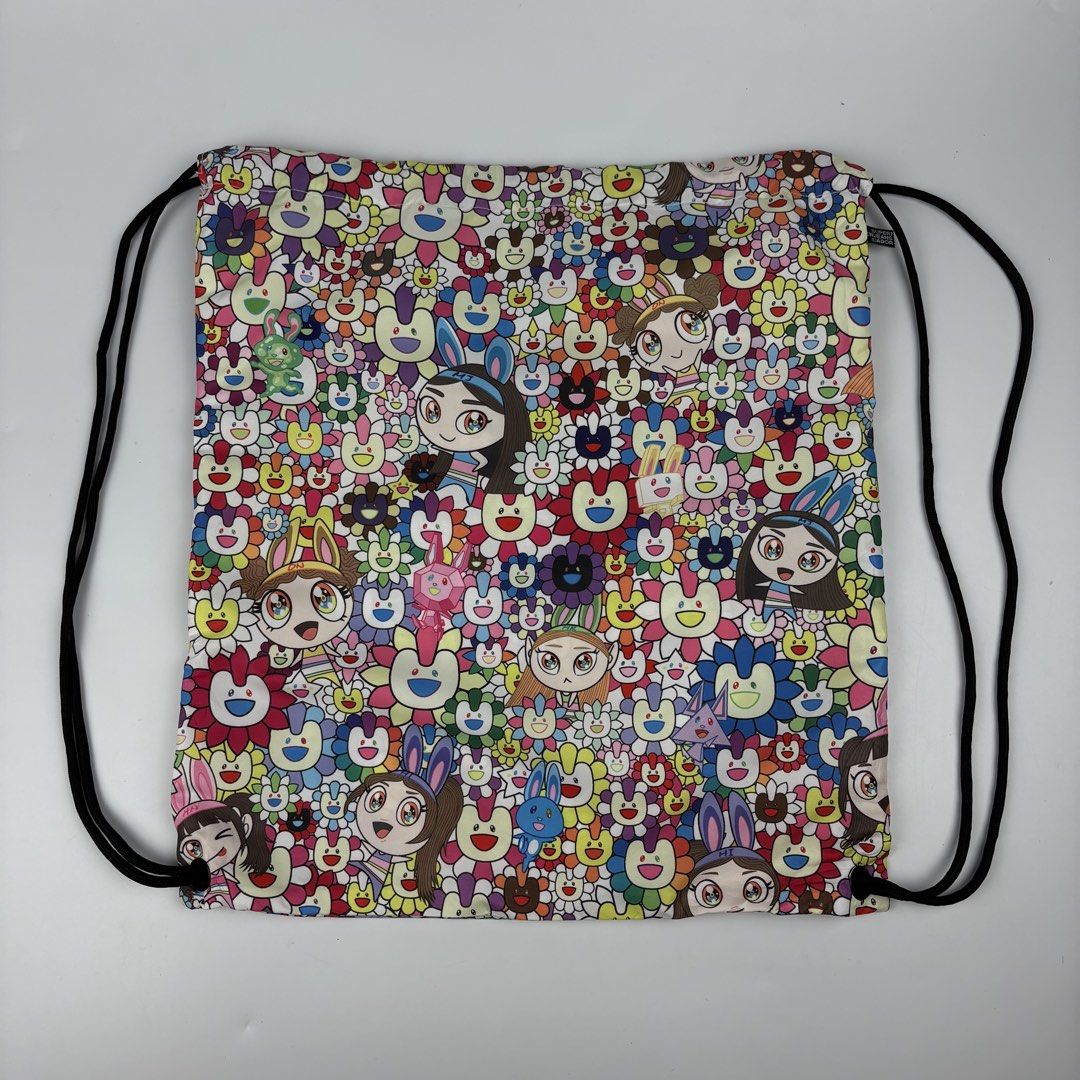 Takashi Murakami - New Jeans - Drawstring Bag (Category: Luxury Bags & Wallets) located in Bacolod City. Submitted by cast.archives (Listing ID 1468470640, Image 3). Description: Takashi Murakami - New Jeans - Drawstring Bag Size: Medium Condition: Excellent Flaw: None.