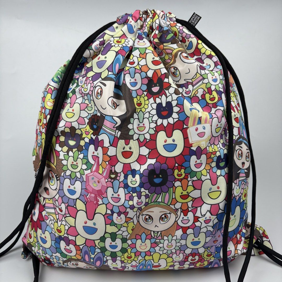 Takashi Murakami - New Jeans - Drawstring Bag (Category: Luxury Bags & Wallets) located in Bacolod City. Submitted by cast.archives (Listing ID 1468470640, Image 2). Description: Takashi Murakami - New Jeans - Drawstring Bag Size: Medium Condition: Excellent Flaw: None.