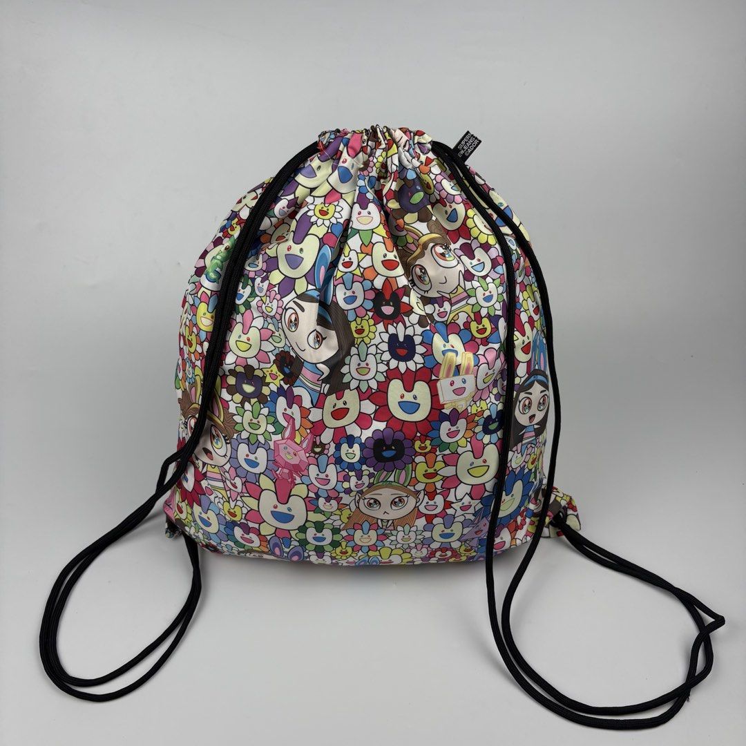 Takashi Murakami - New Jeans - Drawstring Bag (Category: Luxury Bags & Wallets) located in Bacolod City. Submitted by cast.archives (Listing ID 1468470640, Image 1). Description: Takashi Murakami - New Jeans - Drawstring Bag Size: Medium Condition: Excellent Flaw: None.