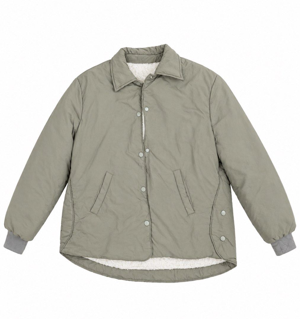 Taupe Fleece Bomber Jacket (unisex) (Category: Coats, Jackets and Outerwear) located in San Fernando. Submitted by akcd12 (Listing ID 1468342225, Image 1). Description: What you see is what you get ✨ Fits - med to large body frame for women or small body frame for men Stylish taupe/beige puffer jacket with a classic collar, button-front closure, long sleeves, and elasticated cuffs. Minor flaw: Faint discoloration/stain on the jacket fabric near t