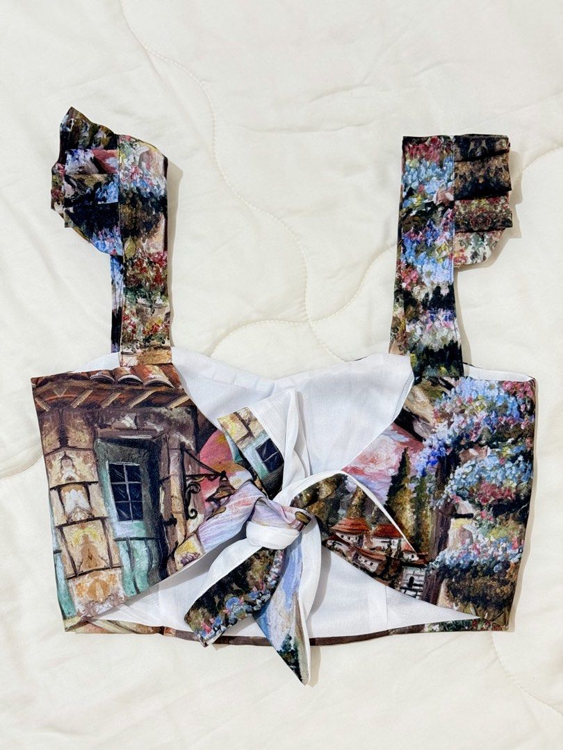 TCPF Leana Ruffles Strap Top (Category: Shirts) located in Naga. Submitted by talaaa_ (Listing ID 1468498996, Image 2). Description: •Size S •RFS: Decluttering [ + gained weight already :( ] •NEVER USED •ㅤSweetheart neckline, wide ruffled straps, & self-tie back knot ㅤ♡ perfect for beach holiday!! SF shall be shouldered by buyer.