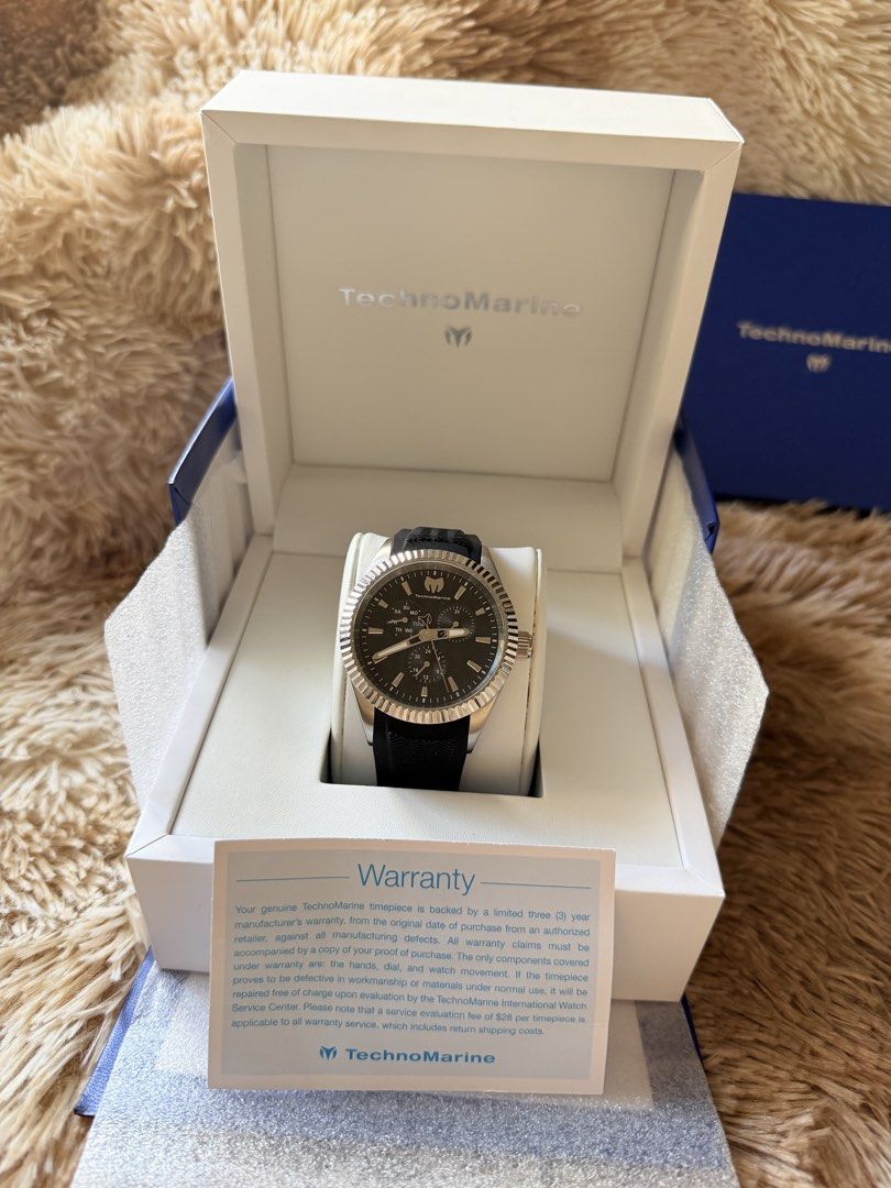TechnoMarine Sea Dream Watch TM-719022 (Category: Luxury Watches) located in Cainta. Submitted by kath_pl (Listing ID 1468340507, Image 1). Description: - Brand: TechnoMarine - Model: Sea Dream (TM-719022) - Dial: Black textured with fluted bezel - Strap: Black rubber - Movement: Japan movement with stainless steel case back - Water Resistance: 5 ATM / 165 FT - Inclusions: Original white presentation box and warranty paper - Condition: Excellent,