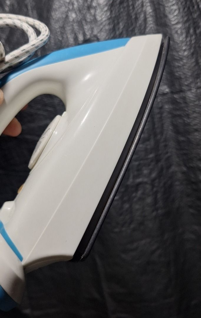 TEFAL Iron (Category: Irons & Steamers) located in General Trias. Submitted by aeunice (Listing ID 1468333178, Image 3). Description: Brand: Tefal Easyway 30 dry iron in blue and white. Features an adjustable temperature dial for various fabrics, a heating indicator light and a durable long braided cord. Ready to use! Meet up / Shipping via Lalamove, JnT, Gogo Express & LBC .