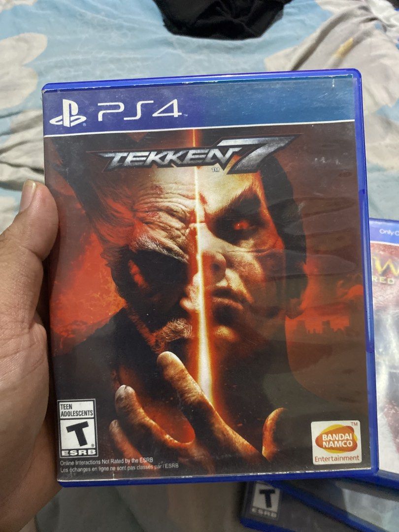 Tekken 7 PS4 Game Disc (Category: PlayStation) located in Manila. Submitted by devilsdontcry (Listing ID 1468410327, Image 1). Description: - Loc sjdm Meetup bellisa proper Game: Tekken 7 (PlayStation 4) - Publisher: Bandai Namco Entertainment - ESRB Rating: T for Teen - Condition: Standard blue plastic case with original front artwork (Heihachi & Kazuya) - Features: Great for local multiplayer and classic arcade action - Compatibility: Works on 