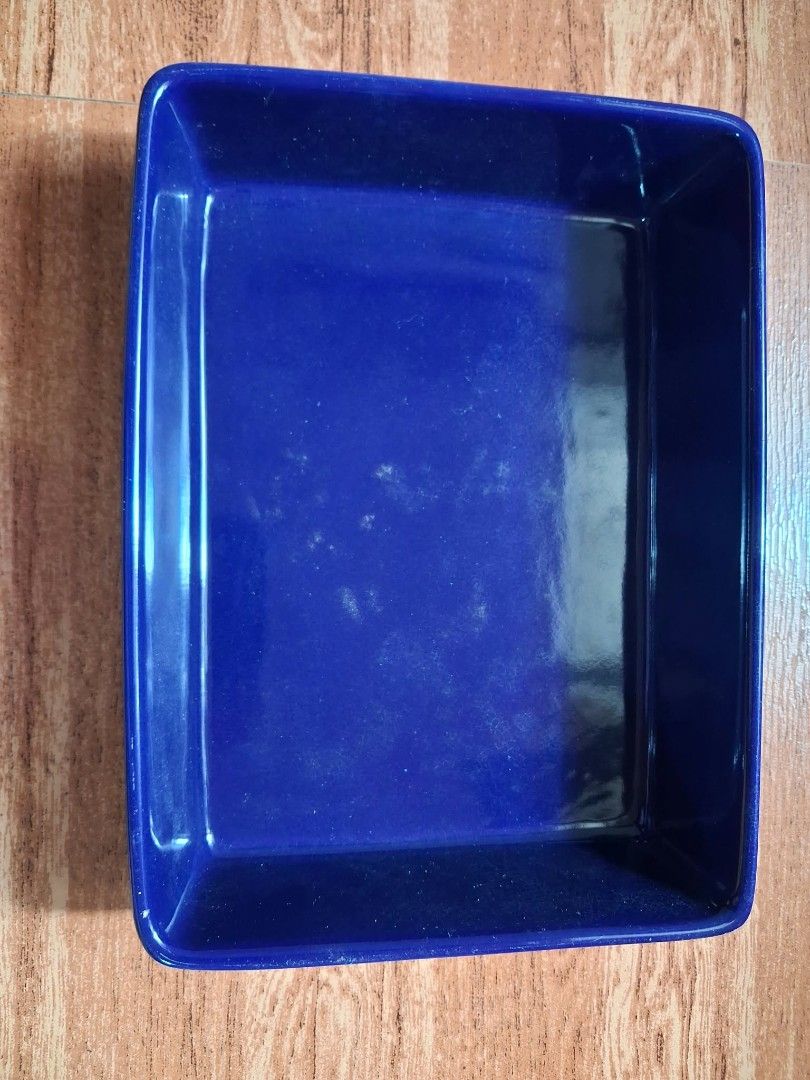 Temp-tations Blue Ceramic Baking Dish (Category: Cookware & Accessories) located in Antipolo. Submitted by ukaylala (Listing ID 1468335532, Image 1). Description: - Brand: Temp-tations - Color/Material: Deep blue ceramic - Dimensions: Approx. 7 x 9.5 inches (rectangular with high sides) - Ideal Use: Great for oven cooking, baking, and casseroles Preferably yung malapit sana kasi babasagin yung item. Location: Antipolo .