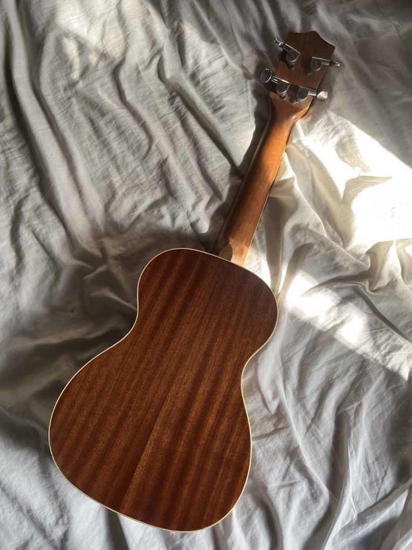 Tenor Ukulele (Category: Musical Instruments) located in Quezon City. Submitted by mangobloom (Listing ID 1468345069, Image 3). Description: i had this baby since i was twelve and time to let her go you can see a lot of defects but it's still good price can be negotiable :) ps. no bag included .