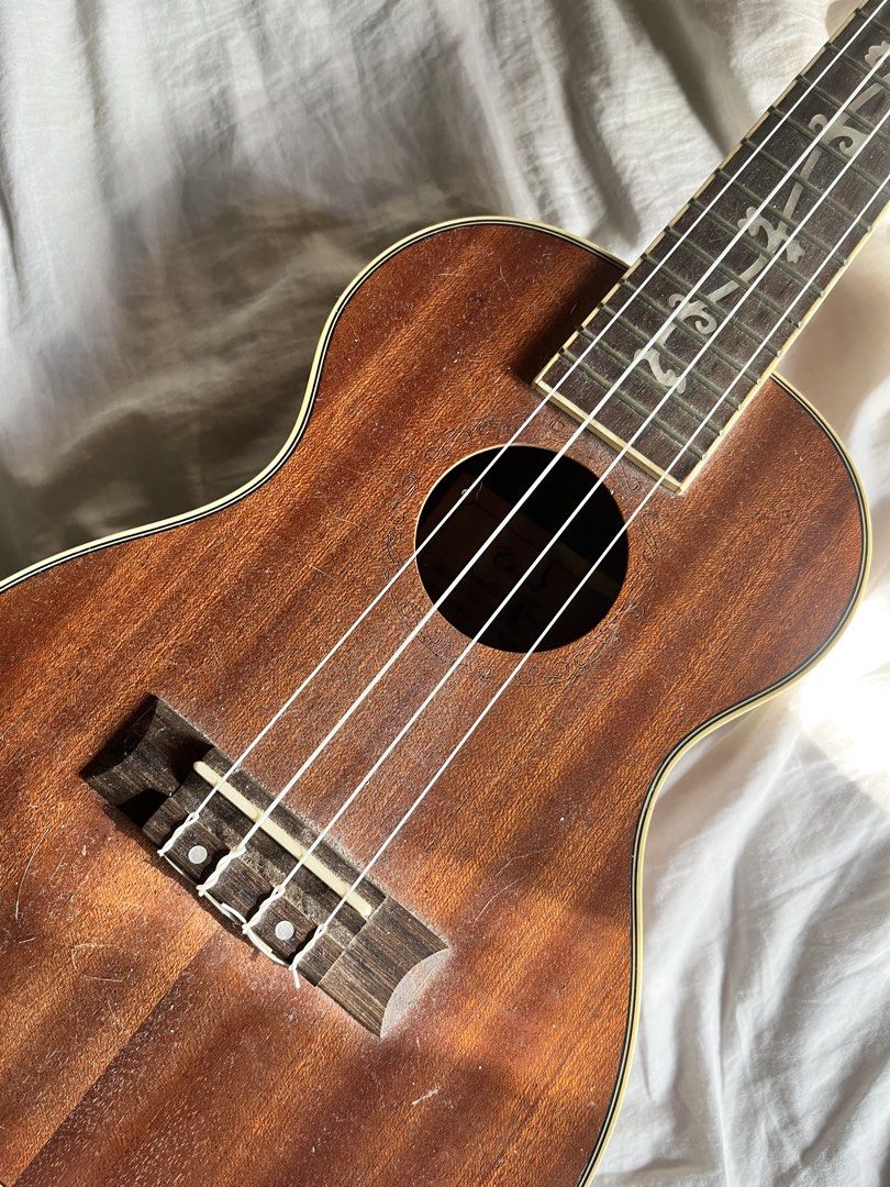 Tenor Ukulele (Category: Musical Instruments) located in Quezon City. Submitted by mangobloom (Listing ID 1468345069, Image 2). Description: i had this baby since i was twelve and time to let her go you can see a lot of defects but it's still good price can be negotiable :) ps. no bag included .