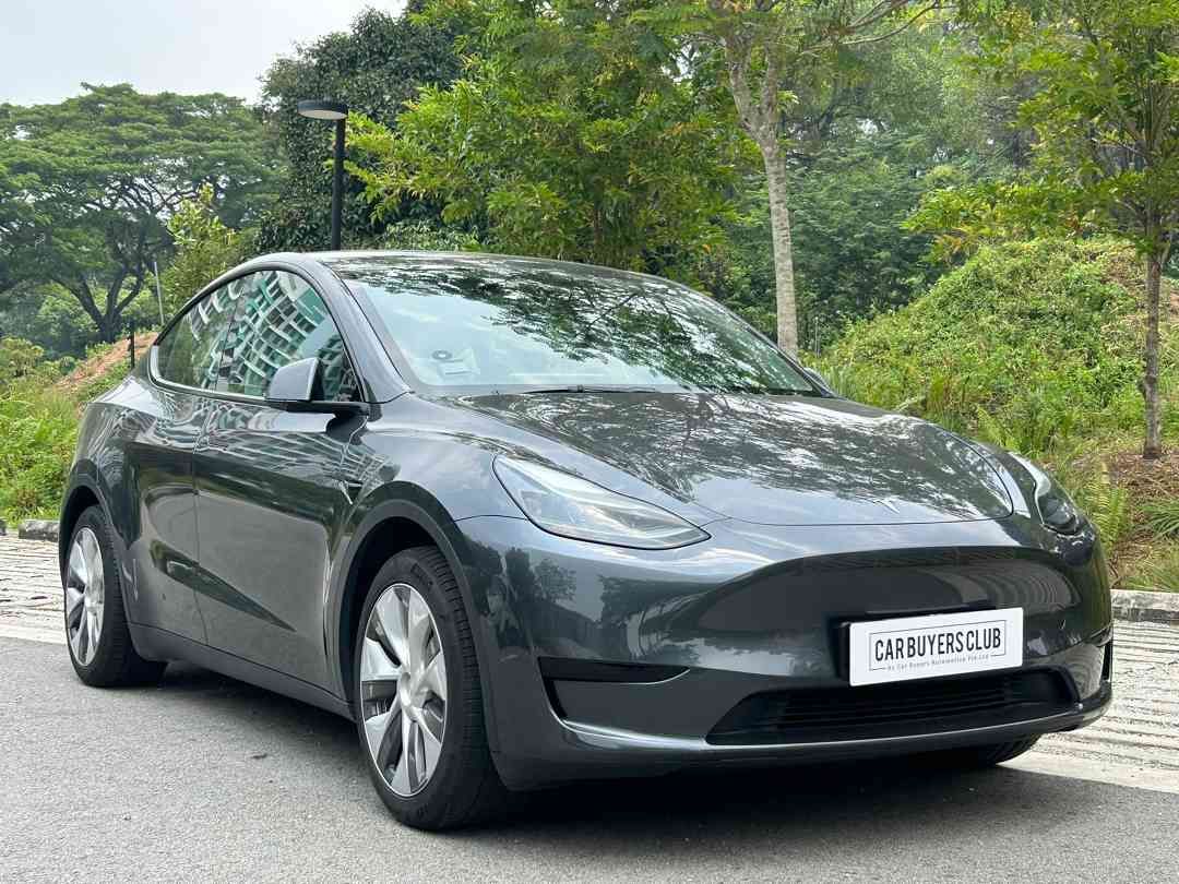 Tesla Model Y Electric RWD (A) (Category: Used Cars) located in Singapore. Submitted by carbuyersclub (Listing ID 1459562902, Image 1). Description: CarBuyers Club SG #1 Tesla reseller, 500+ Google reviews, SGCM Premium Dealer 2026! 1 owner unit in excellent condition. Comes with 8 years battery warranty for a piece of mind. Tesla is well know it safety, top pick for choices 5 star across all regions. Comes with standard vision-based automatic em