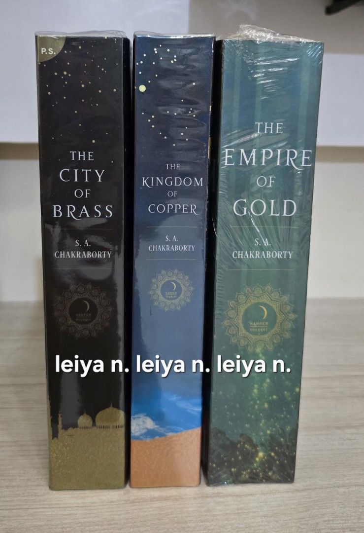 The Daevabad Trilogy by S. A. Chakraborty (Category: Storybooks) located in Manila. Submitted by leiya_lyn (Listing ID 1468358619, Image 1). Description: - Complete Daevabad Trilogy by S. A. Chakraborty - Includes: The City of Brass, The Kingdom of Copper, and The Empire of Gold - Brand new, all 3 books still wrapped in original plastic - Hardcover editions - Published by Harper Voyager.