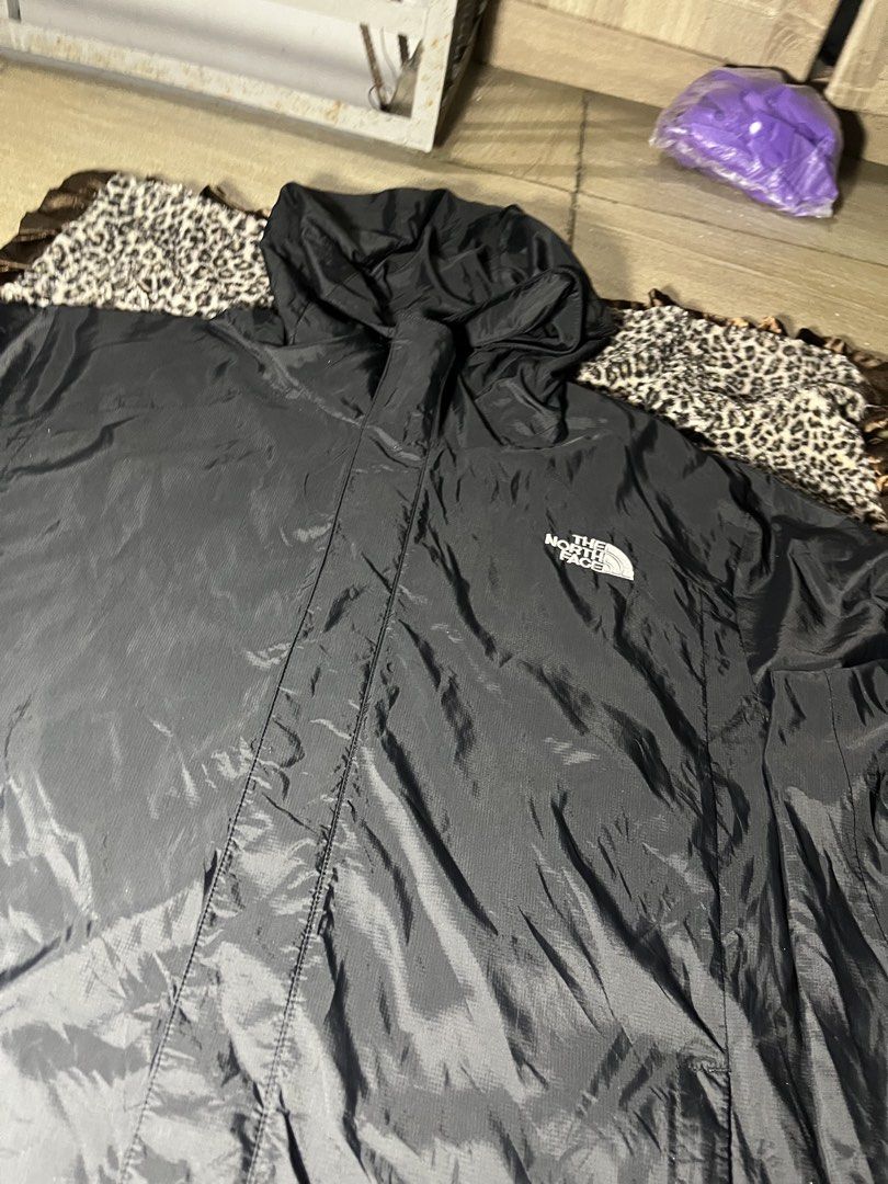 The North Face All-Black Waterproof/Windproof Jacket (Category: Coats, Jackets and Outerwear) located in Manila. Submitted by becarria_thrift23 (Listing ID 1468384890, Image 2). Description: Need a reliable everyday jacket? Grab this sleek The North Face hooded windbreaker. Designed with durable ripstop material, full-zip closure, velcro straps, and an adjustable hood. Complete with internal tags and hologram seal for 100% authenticity With tripl