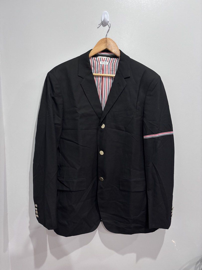 Thom Browne Blazer With Striped Sleeves (Category: Luxury Apparel) located in Dumaguete. Submitted by dgte.grails (Listing ID 1468365221, Image 1). Description: Thom Browne Blazer With Striped Sleeves 21 width 30 length Good as new! 10/10 condition 7,500+sf pm.