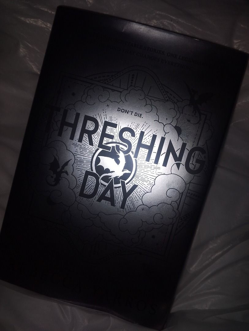 Threshing Day Special Edition Book (Category: Storybooks) located in Sorsogon. Submitted by chelleeax (Listing ID 1468407681, Image 1). Description: - Special Threshing Day collection book inspired by Fourth Wing and Iron Flame - Contains exclusive stories with major spoilers for both books - Stunning full-color dragon art on inner pages by Joe Achajia - Premium black cover with metallic silver typography and illustration - Brand new and unread c