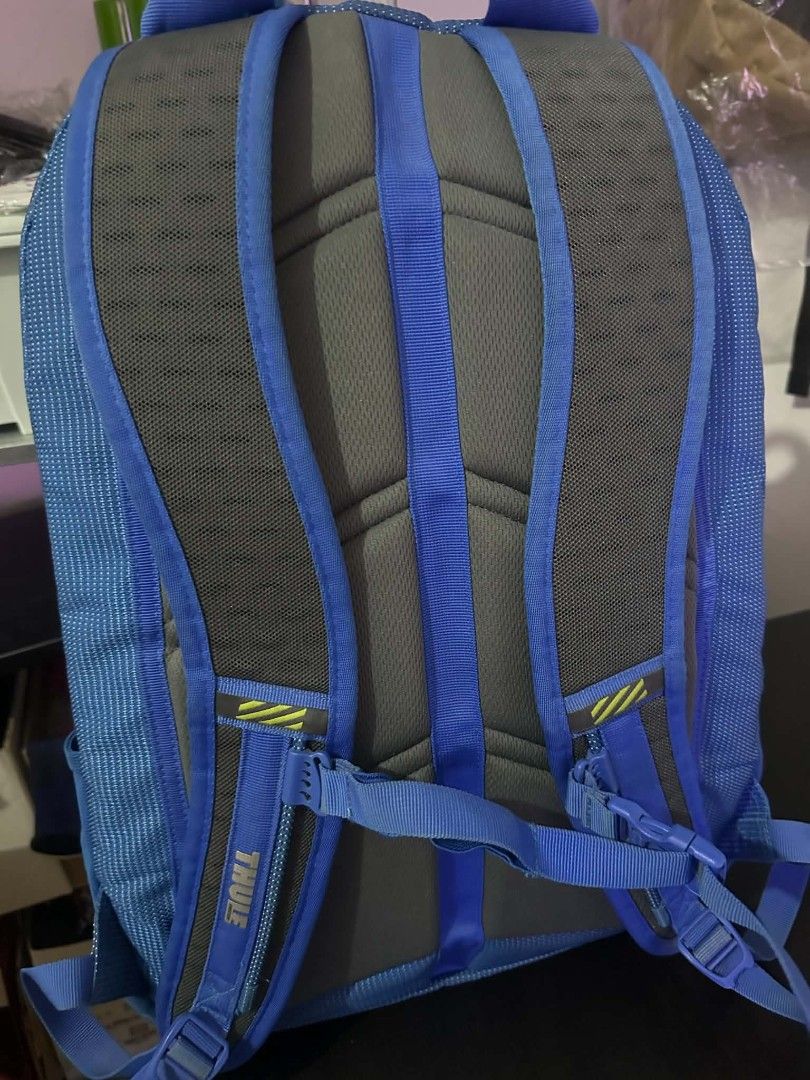 Thule Blue Backpack (Category: Backpacks) located in Las Pinas. Submitted by calmwolf_2a8740 (Listing ID 1468289105, Image 2). Description: - Authentic blue Thule backpack with a unique patterned fabric texture - Ideal for daily school commute, work, or travel - Vertical front zipper pocket for quick access to essentials - Large reflective Thule branding near the base for safety - Padded mesh shoulder straps and adjustable chest buckle strap for 