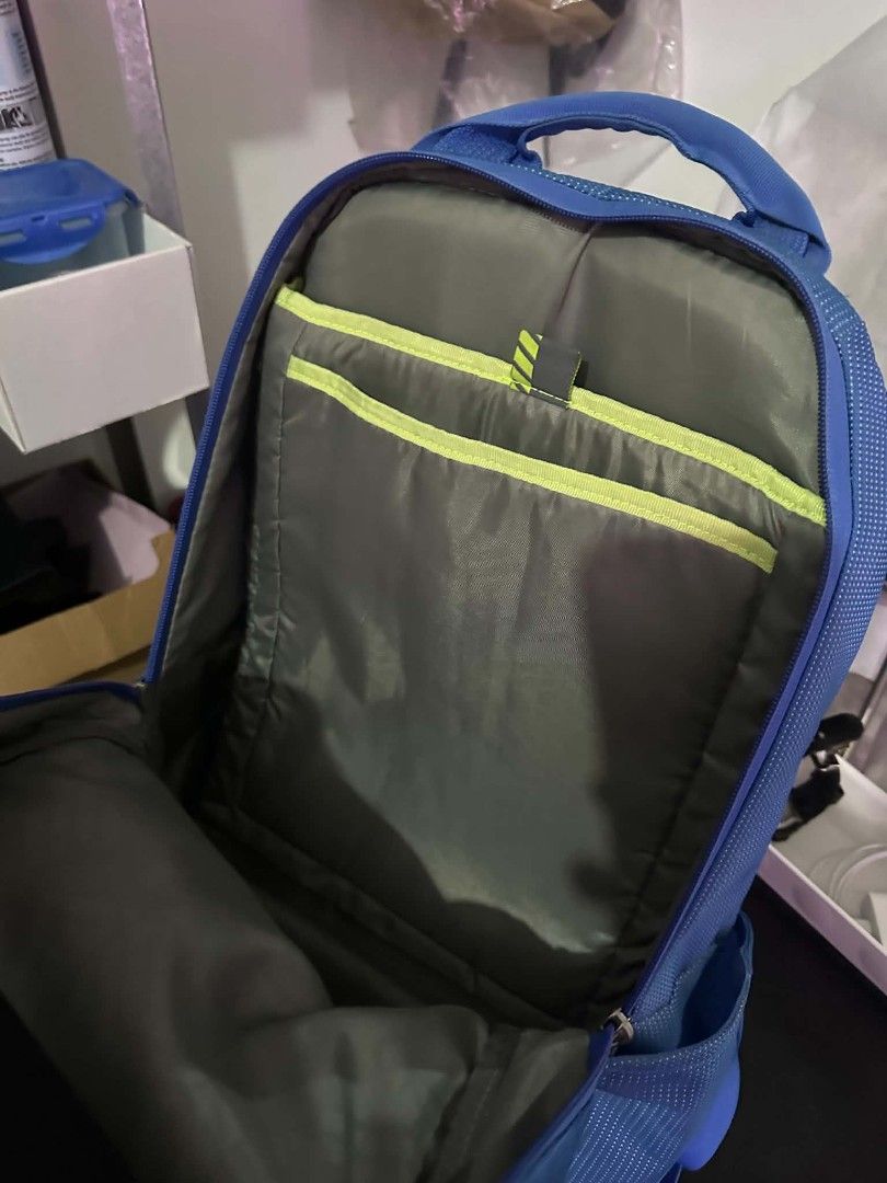 Thule Blue Backpack (Category: Backpacks) located in Las Pinas. Submitted by calmwolf_2a8740 (Listing ID 1468289105, Image 3). Description: - Authentic blue Thule backpack with a unique patterned fabric texture - Ideal for daily school commute, work, or travel - Vertical front zipper pocket for quick access to essentials - Large reflective Thule branding near the base for safety - Padded mesh shoulder straps and adjustable chest buckle strap for 
