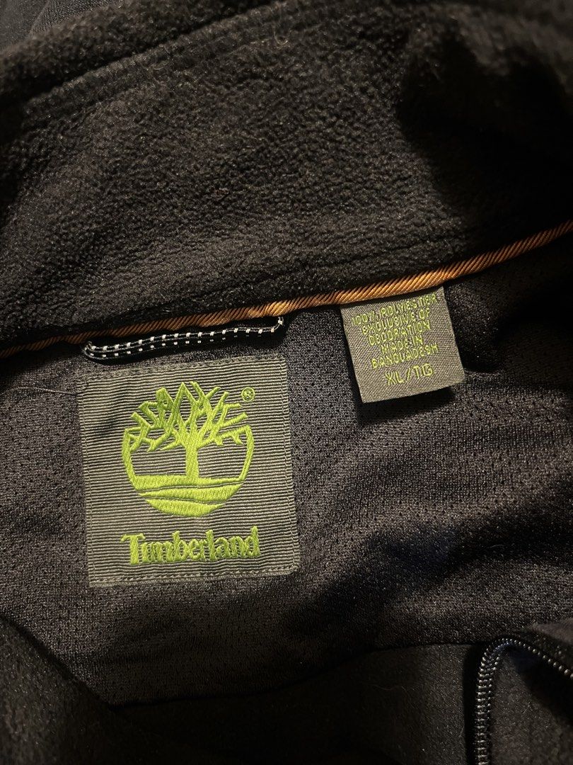 Timberland Black Fleece Zip-Up Jacket (Category: Coats, Jackets and Outerwear) located in Cebu City. Submitted by harborclothing29 (Listing ID 1468389077, Image 3). Description: Timberland fleece jacket in solid black. Full zip front closure with chest zipper pocket. Embroidered logo on the chest. Soft polyester material inside and out. Inside tag shows size XL. Warm layer for cooler weather..