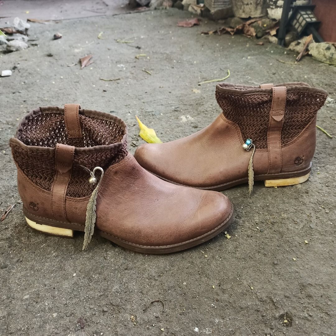 Timberlands Earthkeepers / Boho Knit Ankle Boots (Boho-Style Pull-On Booties). (Category: Boots) located in Cavite. Submitted by kurtgg.what (Listing ID 1468359824, Image 1). Description: Authentic timberlands! courier: j&t/lalamove - Brand: Timberland - Color: Brown - Material: Genuine leather - Style: Slip-on ankle boots with low wooden stacked heel - Unique Details: Crocheted knit collar and dangling side feather charm - Comfort: Equipped with