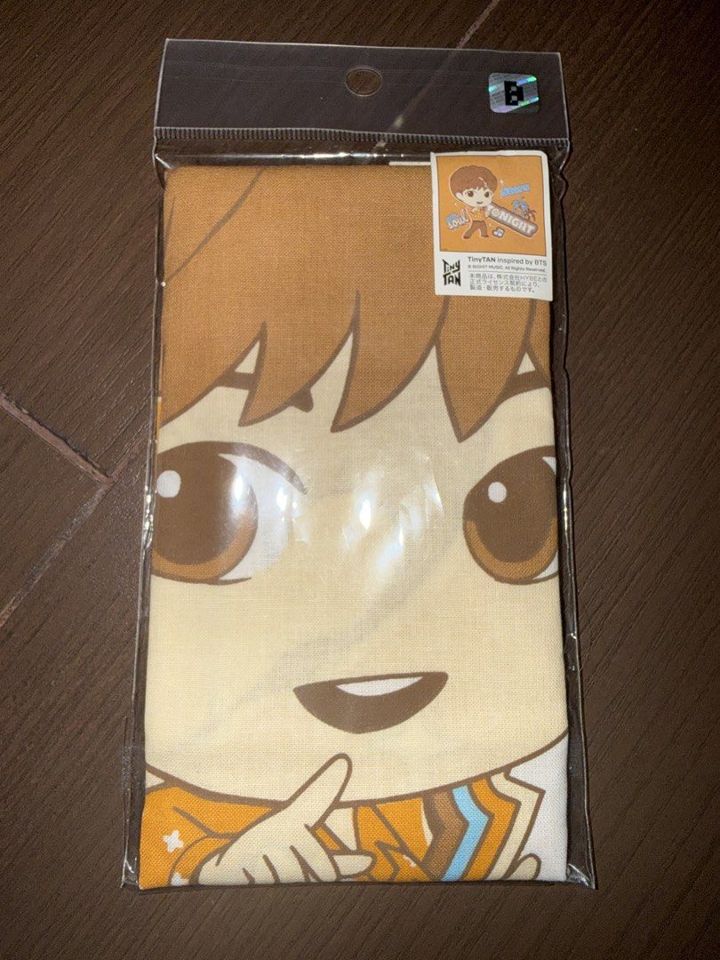 TinyTAN BTS Dynamite Jin big hanky (Category: K-Wave Merchandise) located in Marikina City. Submitted by culose (Listing ID 1468347374, Image 1). Description: - Official TinyTAN BTS merchandise with BHM copyright mark - Vibrant yellow design featuring Soul Tonight lettering and palm trees - Brand new, sealed in original clear plastic packaging - Includes holographic authenticity sticker - Perfect for BTS fans and collectors.