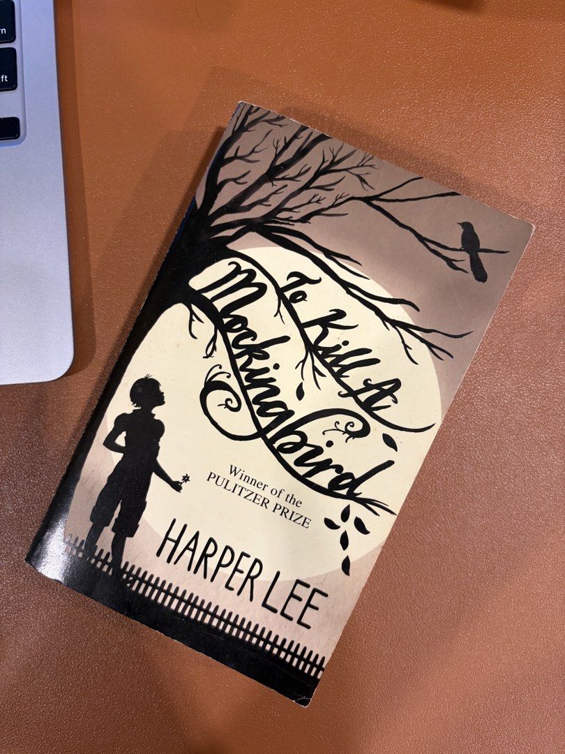 To Kill a Mockingbird by Harper Lee Paperback (Category: Storybooks) located in Cebu City. Submitted by gwyiener (Listing ID 1468462370, Image 1). Description: - Title: To Kill a Mockingbird by Harper Lee - Format: Softcover / Standard paperback - Edition: 2010 art direction - Condition: Pages have natural yellowing from age; text is completely clean and easy to read - Best for: School reading requirements or casual book lovers.