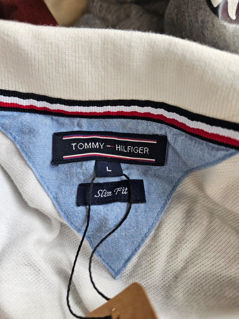 Tommy hilfiger (Category: Tshirts & Polo Shirts ) located in Baguio. Submitted by kayeonlineshop (Listing ID 1468320796, Image 3). Description: Tommy Hilfiger men's white polo shirt -measurements included in the photos.