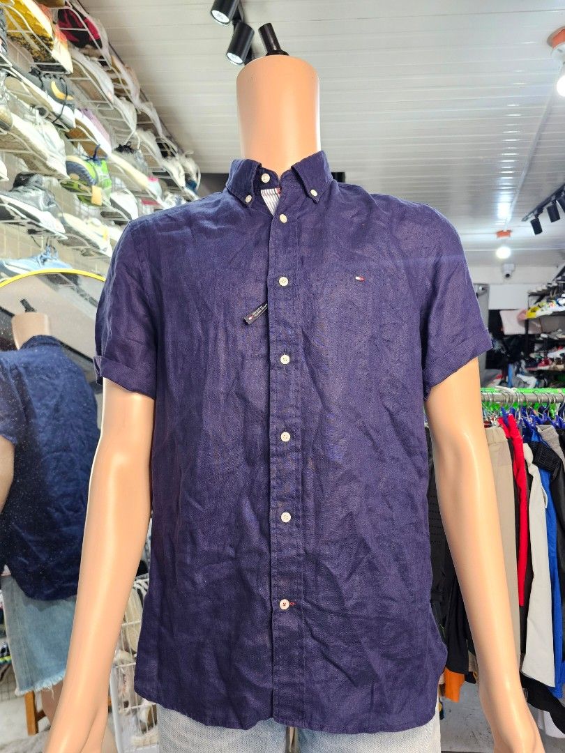 Tommy Hilfiger Polo Shirt (Category: Tshirts & Polo Shirts ) located in Baguio. Submitted by kayeonlineshop (Listing ID 1468308209, Image 2). Description: -dark navy blue short-sleeve button-down shirt by Tommy Hilfiger with a button-down collar and small chest logo embroidery.