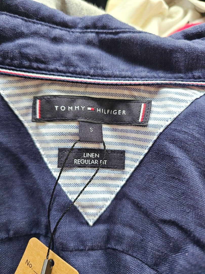 Tommy Hilfiger Polo Shirt (Category: Tshirts & Polo Shirts ) located in Baguio. Submitted by kayeonlineshop (Listing ID 1468308209, Image 3). Description: -dark navy blue short-sleeve button-down shirt by Tommy Hilfiger with a button-down collar and small chest logo embroidery.