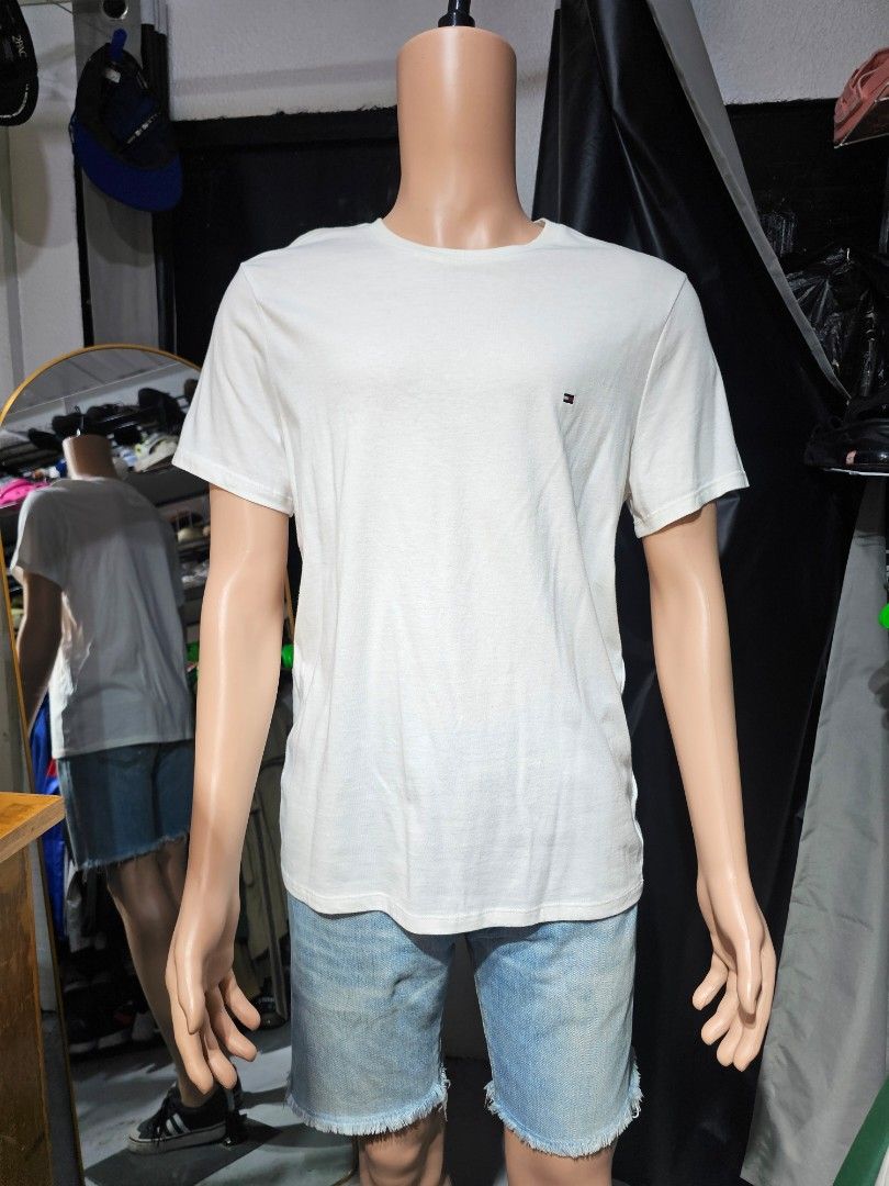 Tommy Hilfiger white shirt (Category: Tshirts & Polo Shirts ) located in Baguio. Submitted by kayeonlineshop (Listing ID 1468333065, Image 1). Description: measurements included in the photos.