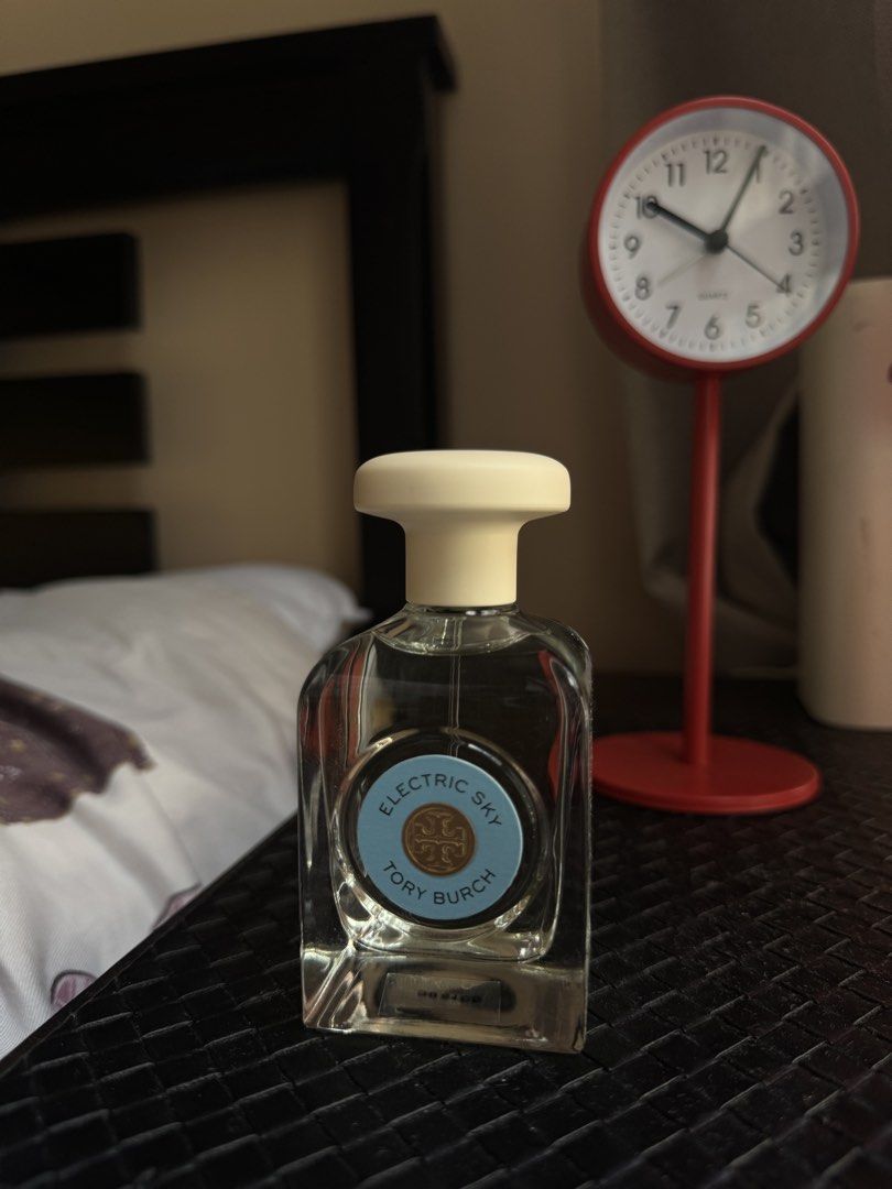 Tory Burch Electric Sky Eau De Parfum 90ml (Category: Fragrance & Deodorants) located in Taguig. Submitted by earlclr (Listing ID 1468294179, Image 1). Description: - Authentic Tory Burch Electric Sky Eau de Parfum - Generous 90ml full-size bottle - Comes with original packaging box - Scent notes: Refreshing cactus flower, calming lavender, and warm wood - Stored properly away from sunlight and heat - Perfect for daily wear or as a gift - RFS: Bl