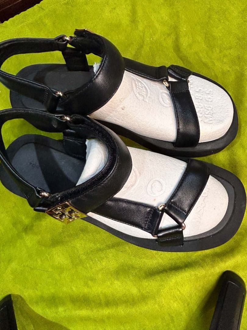 Tory Burch Mellow Sport Sandal (Category: Sneakers & Footwear) located in Quezon City. Submitted by abk_storemandaluyong25 (Listing ID 1468438891, Image 2). Description: Product Details • Brand: Tory Burch • Model: Mellow Sport Sandal / Mellow Platform Sandal • Colorway: Perfect Black / Gold Hardware • Design Features: Sporty, utilitarian silhouette featuring padded sheepskin/nappa leather straps, an adjustable hook-and-loop ankle closure, a comf