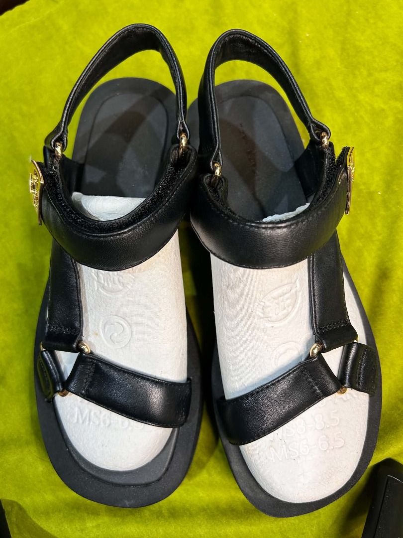 Tory Burch Mellow Sport Sandal (Category: Sneakers & Footwear) located in Quezon City. Submitted by abk_storemandaluyong25 (Listing ID 1468438891, Image 1). Description: Product Details • Brand: Tory Burch • Model: Mellow Sport Sandal / Mellow Platform Sandal • Colorway: Perfect Black / Gold Hardware • Design Features: Sporty, utilitarian silhouette featuring padded sheepskin/nappa leather straps, an adjustable hook-and-loop ankle closure, a comf