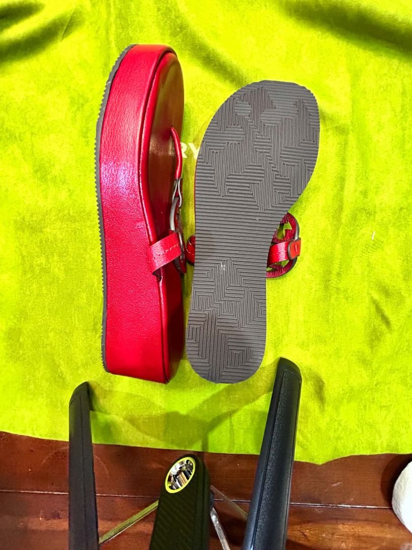 Tory Burch Miller Wedge Sandal (Category: Sneakers & Footwear) located in Quezon City. Submitted by abk_storemandaluyong25 (Listing ID 1468451032, Image 2). Description: Product Details • Brand: Tory Burch • Model: Miller Wedge Sandal / Miller Platform Thong Slide • Colorway: Bright Cherry Red • Materials: Premium pebbled leather upper, leather-wrapped wedge midsole, and a durable rubber outsole. • Design Features: A chunkier, elevated spin on th