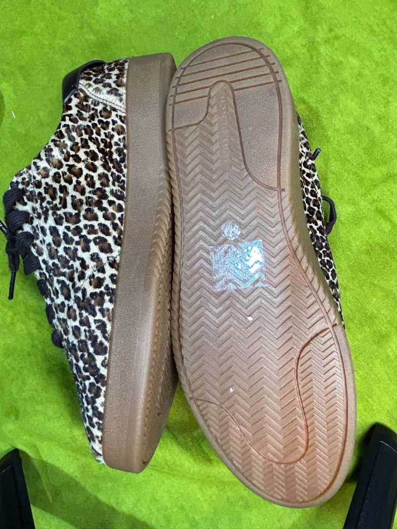 Tory Burch Phoenix Sneakers (Category: Sneakers & Footwear) located in Quezon City. Submitted by abk_storemandaluyong25 (Listing ID 1468438054, Image 2). Description: • Brand & Model: Tory Burch Phoenix Sneakers (Style ID: 178139) • Colorway: Leopard Multi / Brown • Materials: • Upper: Dyed calf hair with leopard pattern and leather trim • Lining: Calf leather / Napa leather lining • Sole: Gum rubber sole with a ~1-inch platform (25 mm) • Feature