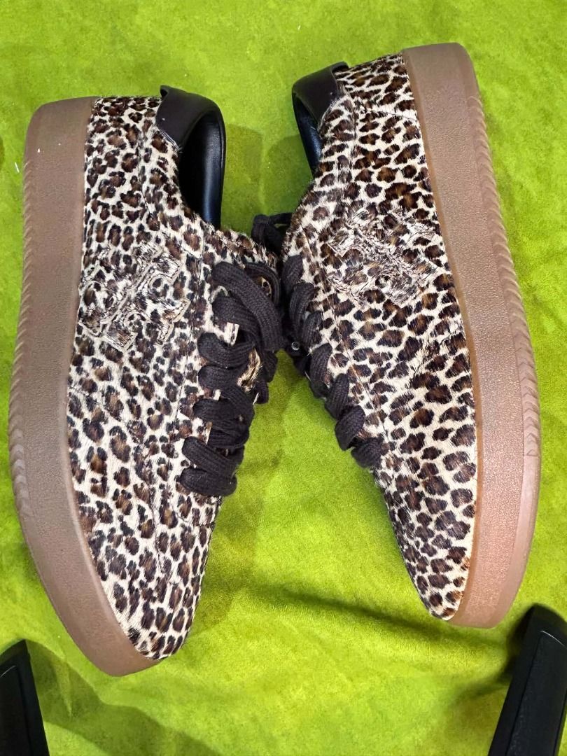 Tory Burch Phoenix Sneakers (Category: Sneakers & Footwear) located in Quezon City. Submitted by abk_storemandaluyong25 (Listing ID 1468438054, Image 3). Description: • Brand & Model: Tory Burch Phoenix Sneakers (Style ID: 178139) • Colorway: Leopard Multi / Brown • Materials: • Upper: Dyed calf hair with leopard pattern and leather trim • Lining: Calf leather / Napa leather lining • Sole: Gum rubber sole with a ~1-inch platform (25 mm) • Feature