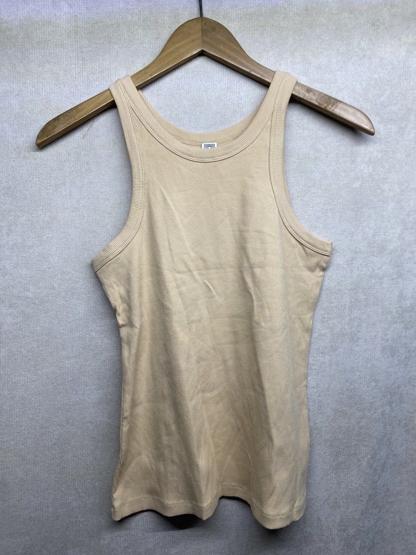 Toteme - Tanktop Cream (Category: Activewear) located in Valenzuela. Submitted by rektasource.ph (Listing ID 1468413332, Image 1). Description: Toteme - Tanktop Cream Medium on tag Length: 23.5 Armpit to armpit: 14.5 Like new condition.