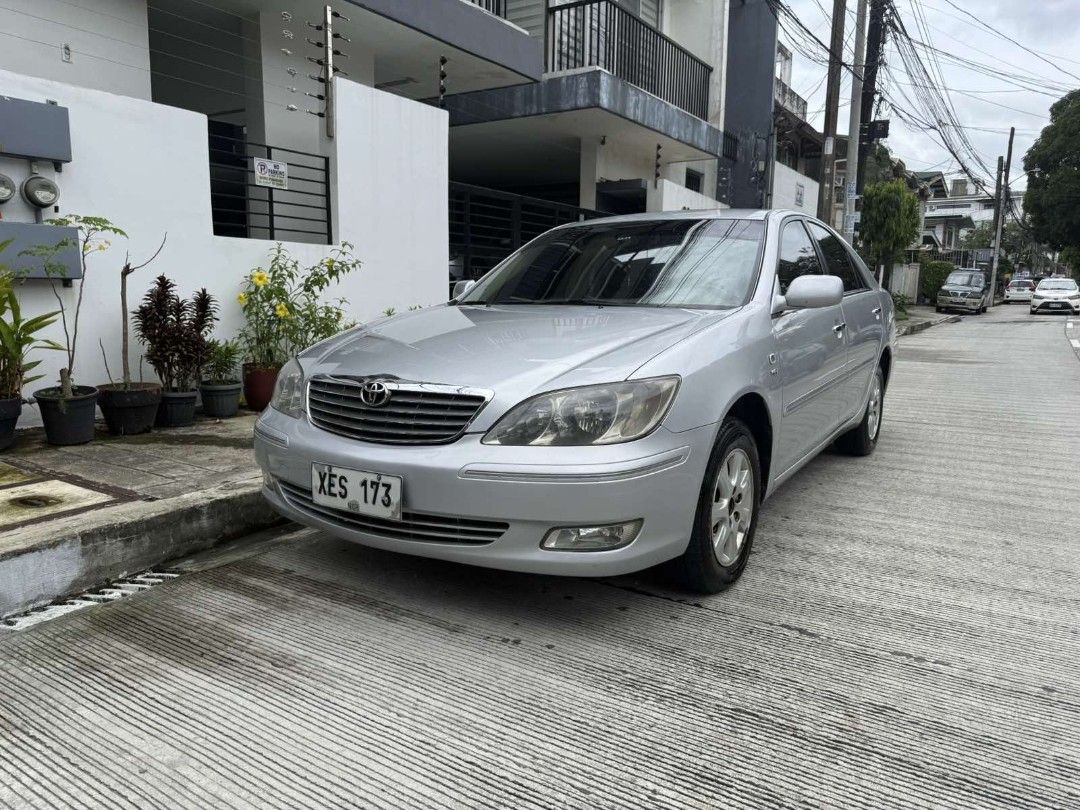 Toyota Camry 2.0 (A) (Category: Used Cars) located in Manila. Submitted by willows.properties (Listing ID 1468353271, Image 1). Description: 2002 Toyota Camry 2.0G Automatic (XV30 Executive Fresh • ALL ORIGINAL) ⭐ Engine: 2.0L VVT-i 16-Valve DOHC Gasoline Engine ⭐ Automatic Transmission ⭐ Mileage: 106,000 km (Low Original Odo) ⭐ Original Paint: Silver Metallic ⭐ Plate Ending in 3 (Tuesday Coding) ⭐ Interior: All-original beige leather seats, wood