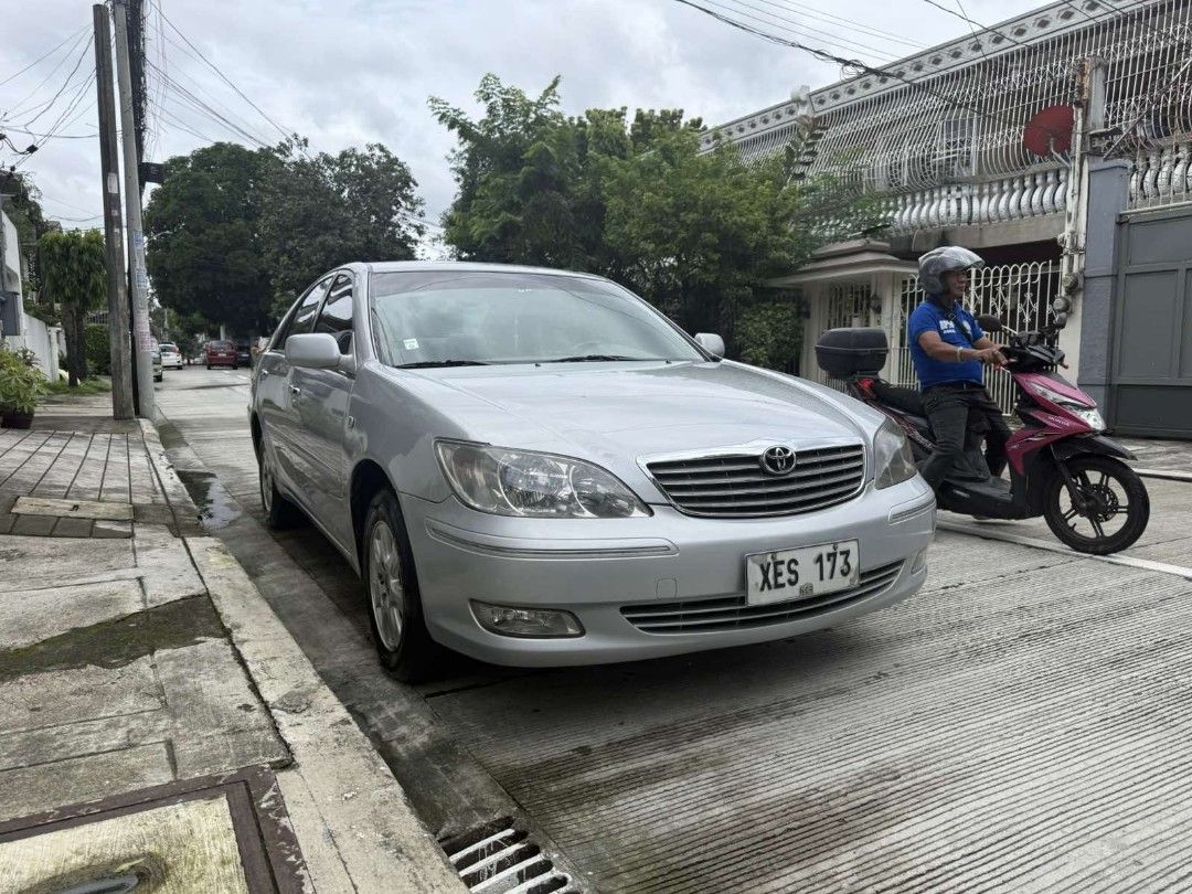 Toyota Camry 2.0 (A) (Category: Used Cars) located in Manila. Submitted by willows.properties (Listing ID 1468353271, Image 2). Description: 2002 Toyota Camry 2.0G Automatic (XV30 Executive Fresh • ALL ORIGINAL) ⭐ Engine: 2.0L VVT-i 16-Valve DOHC Gasoline Engine ⭐ Automatic Transmission ⭐ Mileage: 106,000 km (Low Original Odo) ⭐ Original Paint: Silver Metallic ⭐ Plate Ending in 3 (Tuesday Coding) ⭐ Interior: All-original beige leather seats, wood