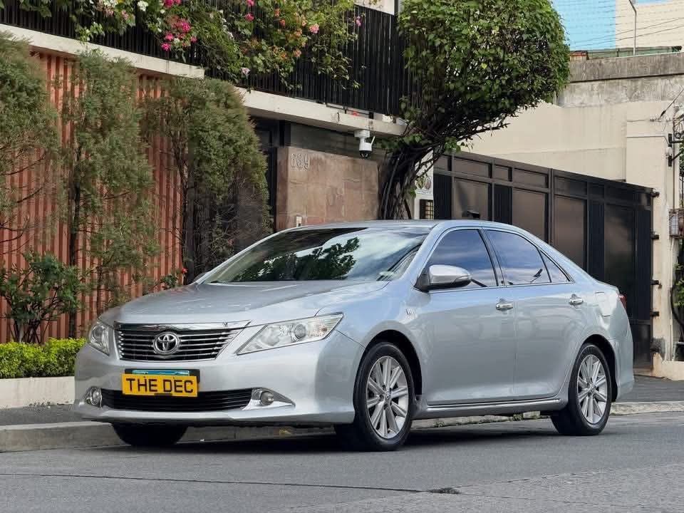 Toyota Camry 2.5V Auto (Category: Used Cars) located in Manila. Submitted by quality_cars (Listing ID 1468459305, Image 3). Description: FOR SALE - Guaranteed Best Buy! ✅ Brand: Toyota Model: Camry 2.5V Year Model: 2013 Transmission: AUTOMATIC Color: Silver Fuel Type: Gas Mileage: 81K Ending Plate: “3” Tuesday Coding MY SELLING PRICE: 433k Trade In Ok, Financing Ok All Stock Wood Panel All Leather Interior Electronic Power Seats Reclinable 2nd Ro