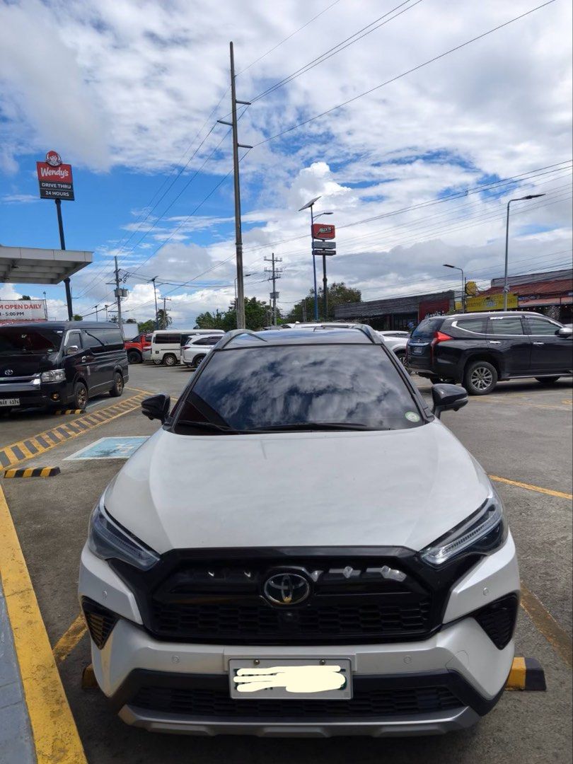 Toyota Corolla Cross HEV GRS Auto (Category: Used Cars) located in Calamba. Submitted by d_curated_market_17 (Listing ID 1468498246, Image 2). Description: 2024 Toyota Cross 1.8 GR-S HEV CVT Platinum WP Mica / Attitude Black Mica NO CODING CASA MAINTAINED Registered until May 2027 Very FRESH NO ISSUES/NOT FLOODED/NO HISTORY OF ACCIDENT/COLLISION Fully Paid (waiting for original papers from bank on or before Oct 28, 2026) 13,500 km mileage First O