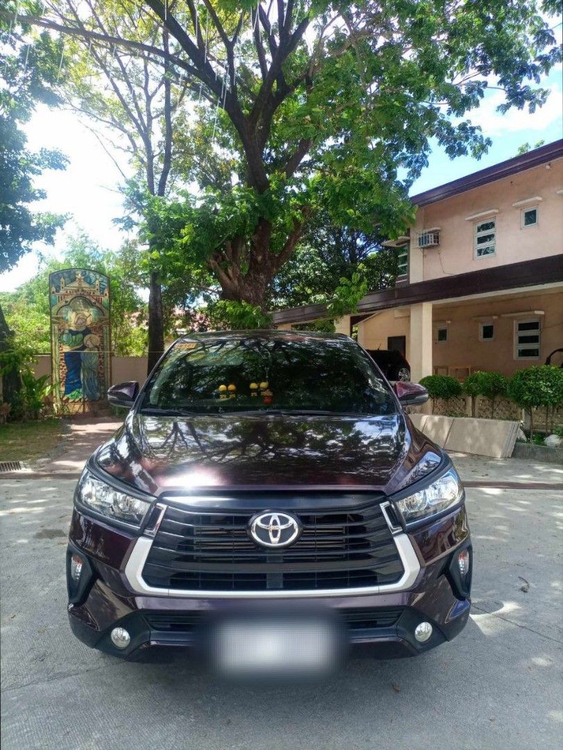 Toyota Innova (Category: Used Cars) located in San Jose del Monte. Submitted by mrs.ca01 (Listing ID 1468408162, Image 1). Description: FOR SALE: 2021 TOYOTA INNOVA 2.8 E AT DIESEL Selling our 2021 Toyota Innova 2.8 E Automatic Diesel for ₱900,000. It has a stated mileage of 22,955 km and comes in Blackies Red. The vehicle is in good condition, subject to actual inspection, with a few light scratches on the body. OR/CR are available. The unit is 