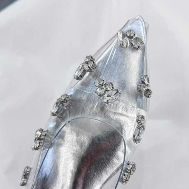 Transparent Rhinestone Pointed Toe Flats (Category: Flats & Sandals) located in Quezon City. Submitted by cuteitemsonlyyy (Listing ID 1468425262, Image 3). Description: - Style: Pointed toe flats with low heels and slip-on design - Material: Clear PVC upper with stylish metallic silver insoles - Details: Dazzling rhinestone clusters on the upper and sides - Condition: Brand new - Mode of Payment: GCash, BPI, or Maya - Shipping: Via J&T Express or