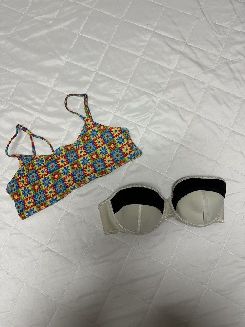 Triangl Bikini Set Size M (Category: Bikinis & Swimsuits) located in Valenzuela. Submitted by prelovedbyramsie (Listing ID 1468421062, Image 1). Description: - Brand: Triangl - Set includes: Colorful floral pattern top with straps and black/cream underwire top with branded clasp - Size: Medium (tagged on floral piece) - Origin: Made in China - Condition: Great mix and match swimwear pieces for beach days.