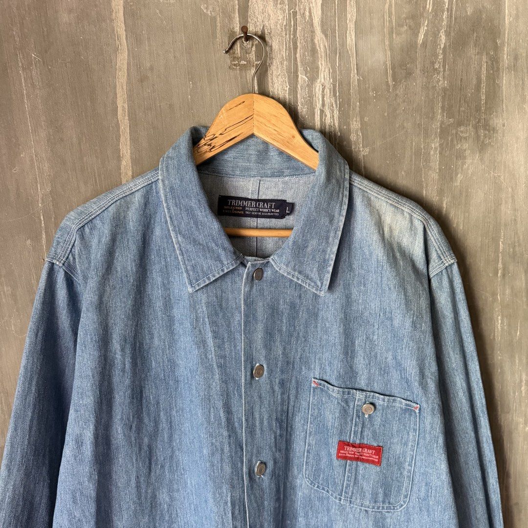 TRIMMER CRAFT Denim Chore Jacket Size (Category: Coats, Jackets and Outerwear) located in Puerto Princesa. Submitted by terdsthrift (Listing ID 1468425991, Image 3). Description: TRIMMER CRAFT Denim Chore Jacket Width: 24 Length: 29 Shoulder: 20.5 In Excellent Condition / No Issue Color Rate: 10/10 - Brand/Model: TRIMMER CRAFT workwear jacket - Color/Wash: Light wash denim / versatile indigo - Style: Classic chore coat with structured collar and 